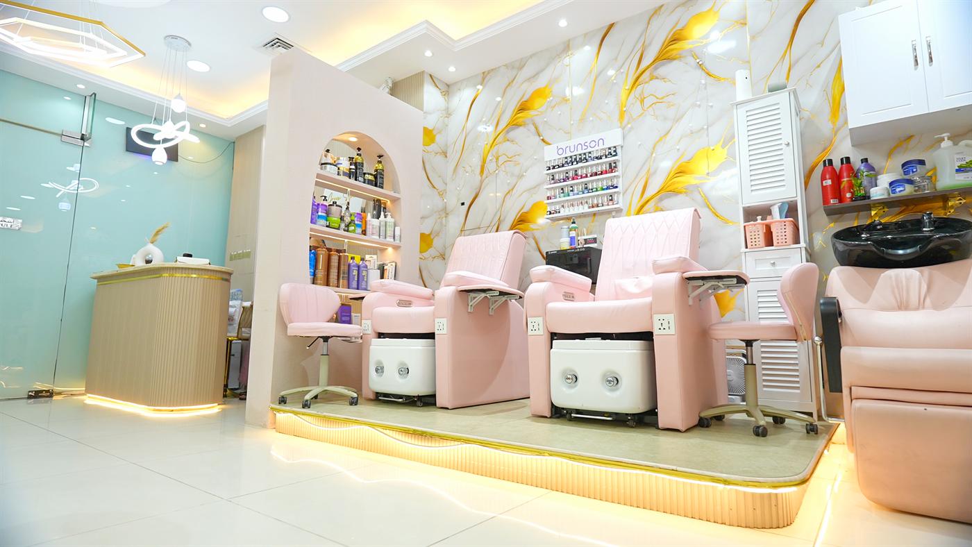 Bright salon interior with product shelves and treatment chairs